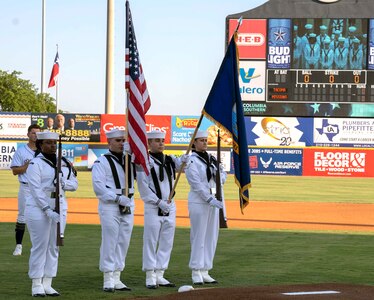 Navy Information Operations Command Texas presents the colors during a San Antonio Missions baseball game in honor of military appreciation night June 12.