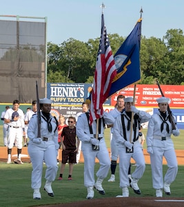 Navy Information Operations Command Texas presents the colors during a San Antonio Missions baseball game in honor of military appreciation night June 12.