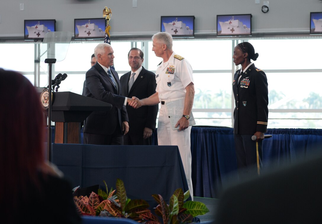 Vice President Mike Pence greets Adm. Craig Faller.