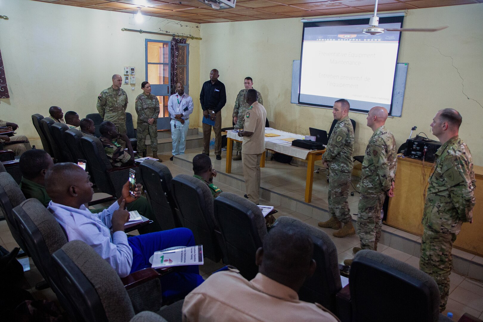 Chief Warrent Officer 2 Tracy Batten, a supervisory equipment specialist, gives a class over Excel and data analysis during the site visit component of Operation Hydrocarbon June 12, 2019 at Camp Badage, Niger. The operation was a five-day exercise with a goal of exchanging tactic, procedures, and techniques for fuel, logistical, and maintenance operations.