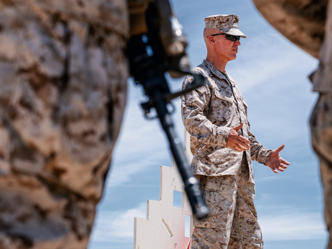 U.S. Marine Corps Chief Warrant Officer James Curtis, infantry weapons officer, 7th Marine Regiment, 1st Marine Division, I Marine Expeditionary Force, makes comments during the ribbon cutting ceremony for the re-opening of Range 105A at Marine Corps Air Ground Combat Center, Twentynine Palms, Calif., June 17, 2019. The range was re-designed to offer multiple, efficient types of training to individual Marines and squad-sized elements. (U.S. Marine Corps photo by Cpl. Rachel K. Young-Porter)
