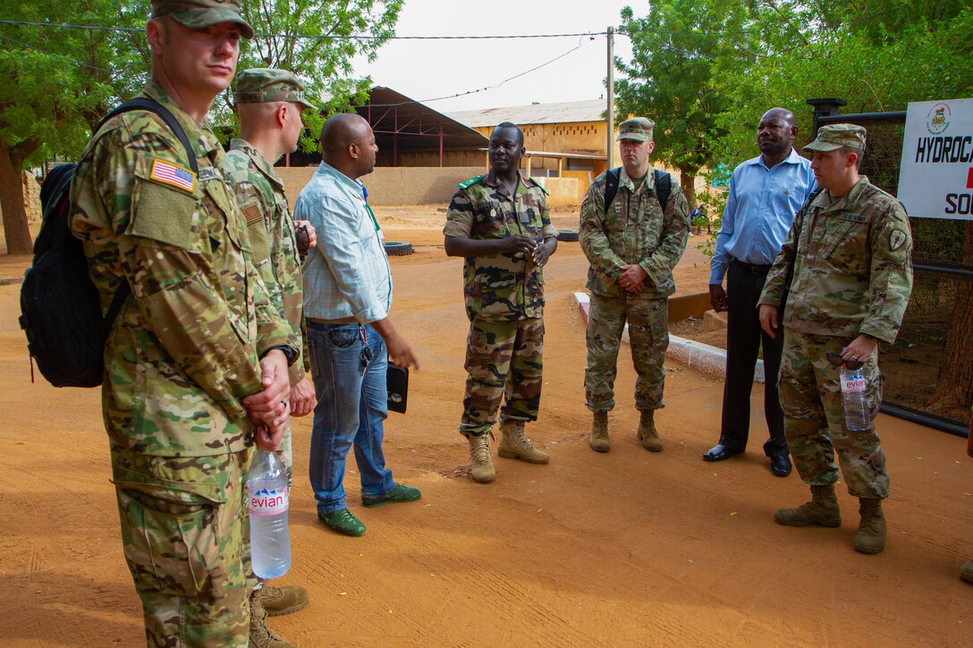 Chief Warrent Officer 2 Tracy Batten, a supervisory equipment specialist, gives a class over Excel and data analysis during the site visit component of Operation Hydrocarbon June 12, 2019 at Camp Badage, Niger. The operation was a five-day exercise with a goal of exchanging tactic, procedures, and techniques for fuel, logistical, and maintenance operations.