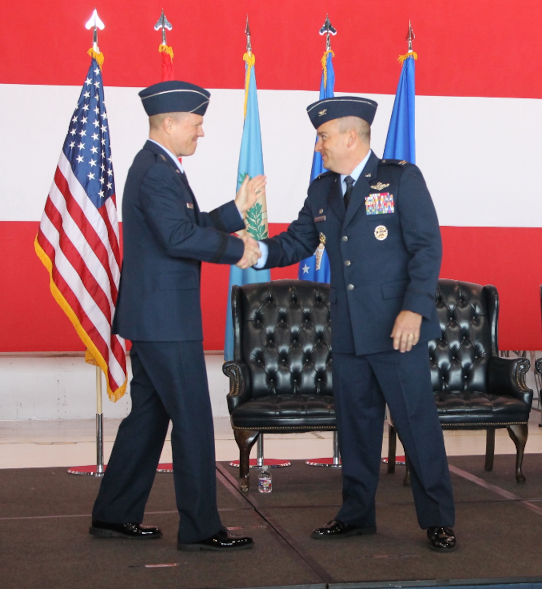Col. Alain D. Poisson, right, is welcomed as the 552nd Air Control Wing commander by Maj. Gen. Andrew A. Croft, 12th Air Force (Air Forces Southern) commander, during the change of command ceremony June 10, 2019, Tinker Air Force Base, Oklahoma. Col. Geoffrey Weiss relinquished command of the 552 ACW to Col. Alain D. Poisson. (U.S. Air Force photo/2nd Lt. Ashlyn K. Paulson)