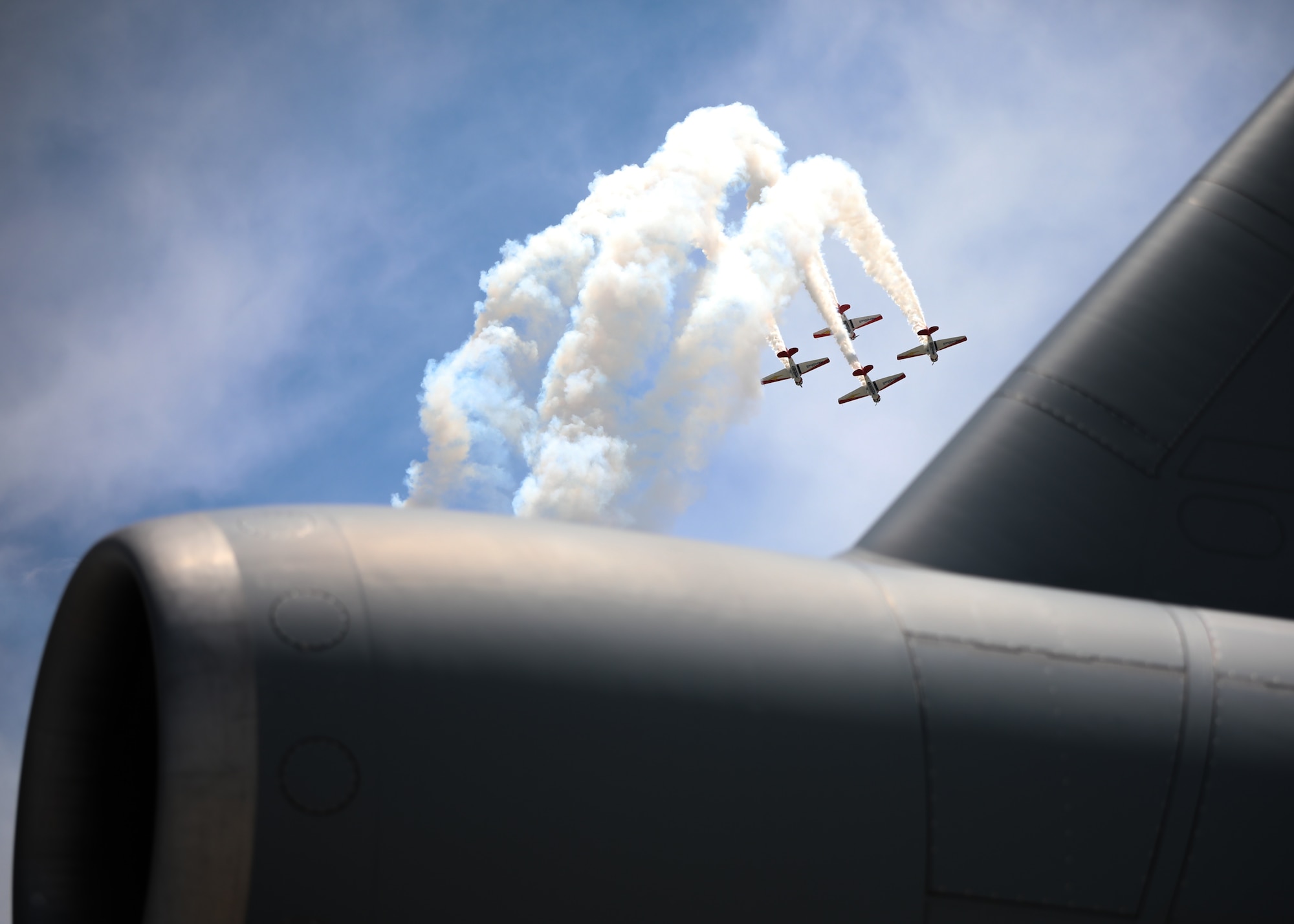 The Aeroshell AT-6 Texan Aerobatic Team performs during the Wings over Whiteman Air and Space Show