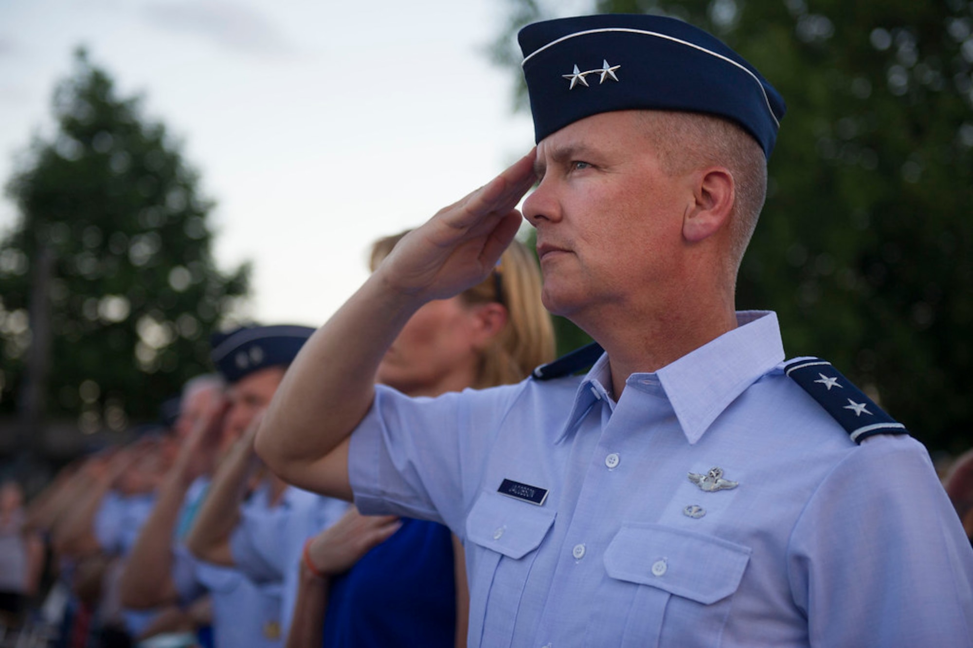 Air Force District of Washington Commander Maj. Gen. James A. Jacobson renders honors during the playing of the national anthem at the Air Force Memorial in Arlington Va., July 7, 2017 at the start of  the Heritage to Horizons concert series. U.S. Air Force Vice Chief of Staff Gen. Stephen W. Wilson hosted the event, which was the third concert of the series. The Heritage to Horizons concerts are a recurring public ceremonial event that takes place at the Air Force Memorial and honor those who support the Air Force. The theme of the third concert was Airmen who Broke Barriers. (U.S. Air Force Photo by Senior Master Sgt. Adrian Cadiz)(Released)