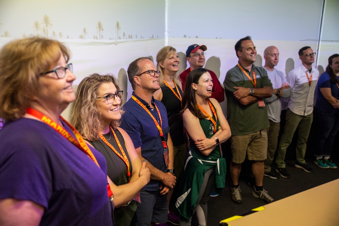 Educators participate in training with a combat convoy simulator during Marine Corps Recruiting Command’s 2019 Educators and Key Leaders Workshop at Marine Corps Base Quantico, Virginia, June 19. The workshop educates approximately 45 professors, coaches, administrators and counselors from colleges across the nation about essential Marine Corps leadership skills and programs they can share with their students based on first-hand experiences. (U.S. Marine Corps photo by Cpl. Naomi May)