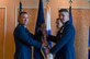 U.S. Air Force Maj. Gen. Chad Franks, left, Ninth Air Force commander, relinquishes the guidon for the 633rd Air Base Wing to the incoming commander, Col. Clinton Ross, during a change of command ceremony at Joint Base Langley-Eustis, Virginia, June 20, 2019.