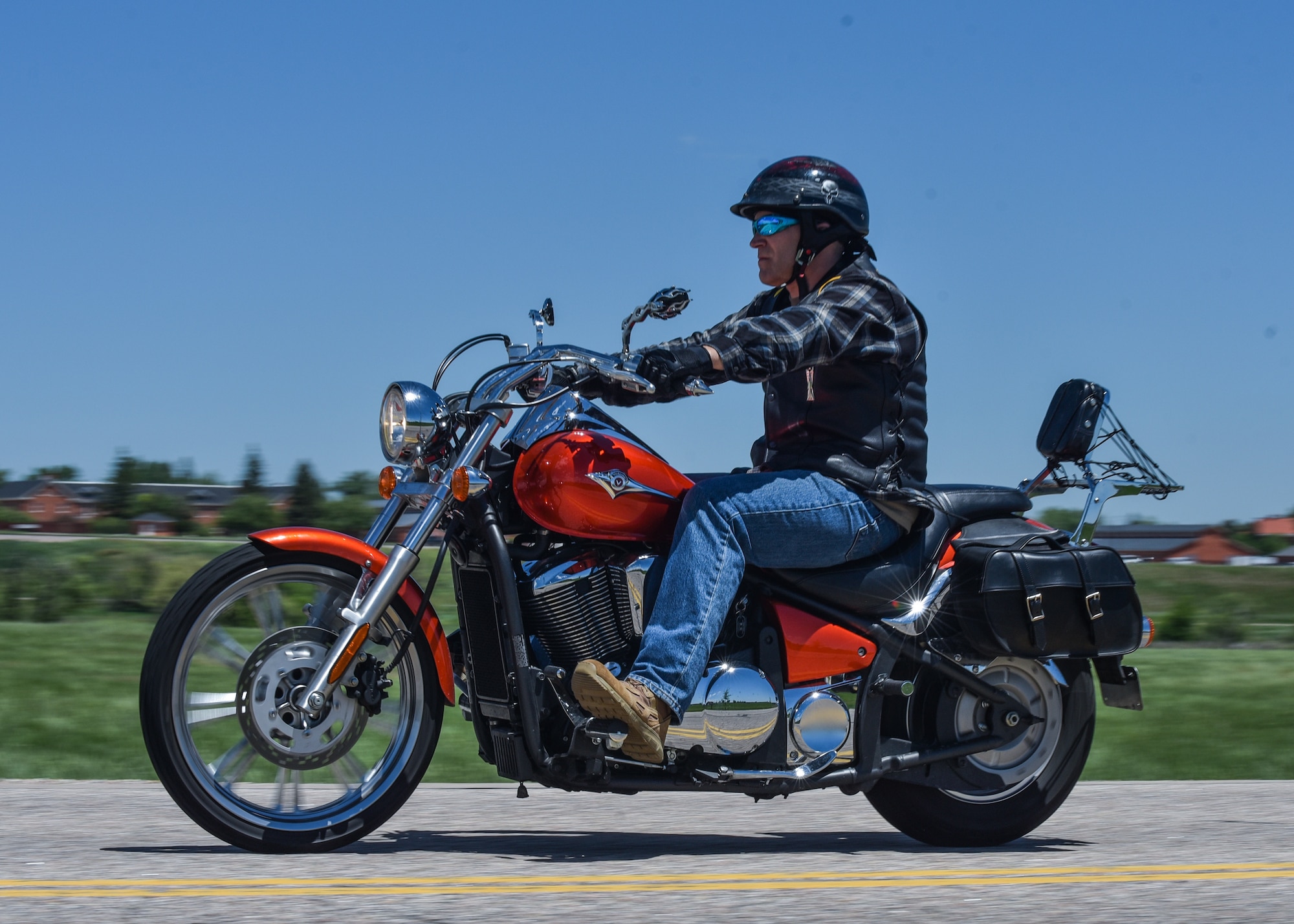 Chief Master Sgt. Beau Jones, 90th Missile Maintenance Squadron maintenance advisor, rides his motorcycle down the road June 20, 2019, on F.E. Warren Air Force Base, Wyo. Due to his vast number of hobbies and talents Jones is commonly called the most interesting Chief at F.E. Warren by his peers. (U.S. Air Force photo by Senior Airman Braydon Williams)