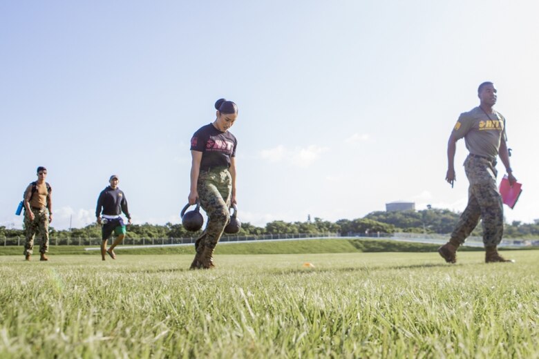 A U.S. Marine with Marine Corps Installations Pacific (MCIPAC), competes in the High Intensity Tactical Training (HITT) Preliminary Challenge on Camp Hansen, Okinawa, Japan, June 15, 2019.