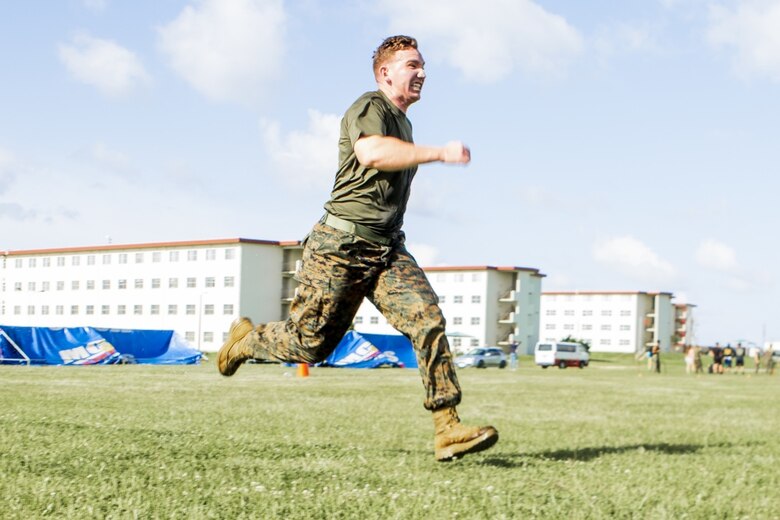 A U.S. Marine with Marine Corps Installations Pacific (MCIPAC), competes in the High Intensity Tactical Training (HITT) Preliminary Challenge on Camp Hansen, Okinawa, Japan, June 15, 2019.