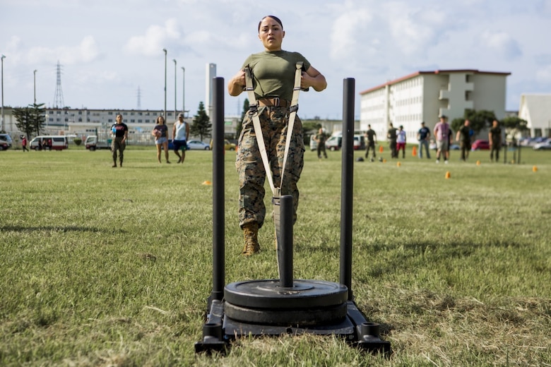 A U.S. Marine with Marine Corps Installations Pacific (MCIPAC), competes in the High Intensity Tactical Training (HITT) Preliminary Challenge on Camp Hansen, Okinawa, Japan, June 15, 2019.
