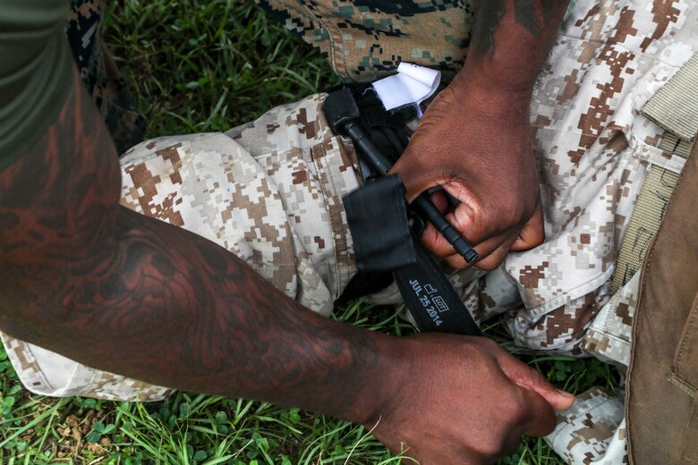 U.S. Navy Chief Hospital Corpsman Anaalicia Henderson, assigned to 3rd Medical Battalion, 3rd Marine Logistics Group (3rd MLG), provides care to a simulated casualty June 17, 2019 on Camp Foster, Okinawa, Japan.
