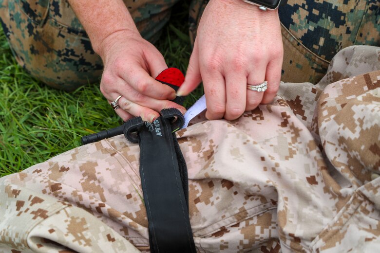 U.S. Navy Chief Hospital Corpsman Anaalicia Henderson, assigned to 3rd Medical Battalion, 3rd Marine Logistics Group (3rd MLG), provides care to a simulated casualty June 17, 2019 on Camp Foster, Okinawa, Japan.
