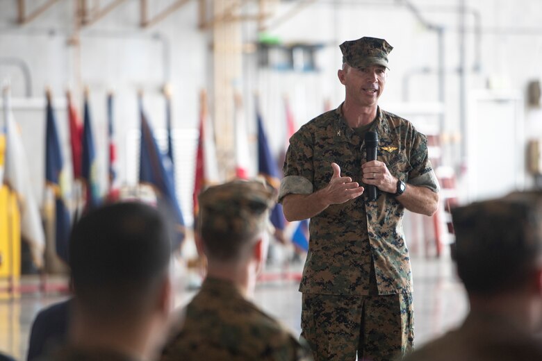 U.S. Marine Corps Col. David Steele, commanding officer of Marine Corps Air Station Futenma (MCAS), delivers a speech during a change of command ceremony June 21, 2019 at MCAS. The change of command ceremony was held in honor of U.S. Marine Corps Lt. Col. Brian Ashford relinquishing his duties as commanding officer of Headquarters and Headquarters Squadron, Marine Corps Installations Pacific, to Lt. Col. Eric Starr. (U.S. Marine Corps photo by Lance Cpl. Savannah Mesimer)