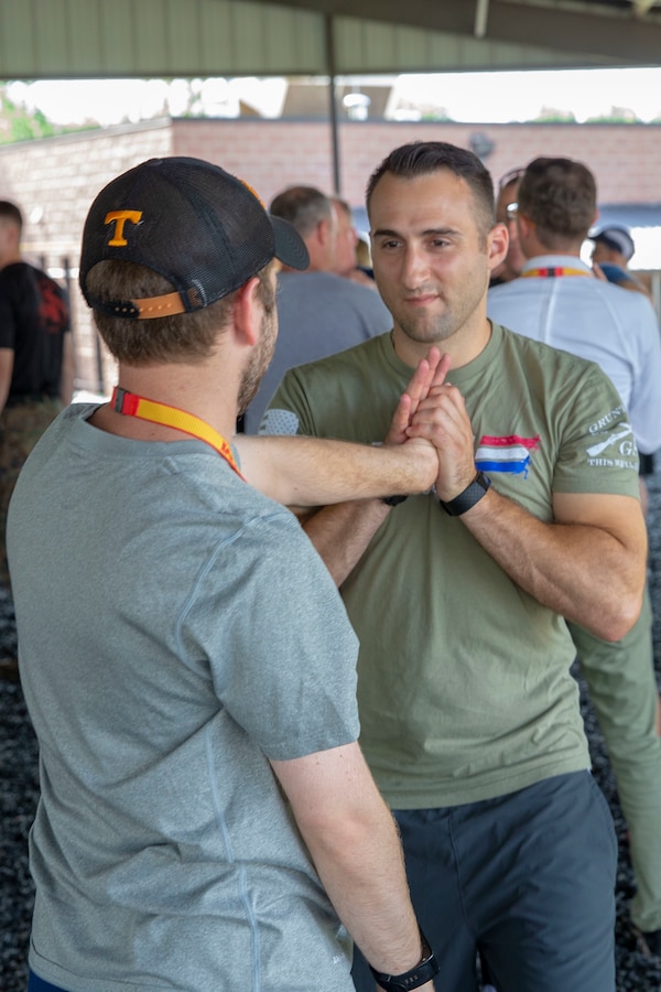 Daniel Pape, an associate director of employer development at the University of Tennessee- Knoxville, and Jeremiah Hust, a military funding coordinator at Coastal Carolina University, try the reverse wrist-lock take down technique during Marine Corps Recruiting Command’s 2019 Workshop aboard Marine Corps Base Quantico, Virginia, June 20 2019. Educators and key influencers from an array of colleges and universities across the United States attend the workshop each summer to discover the leadership traits and career opportunities the Corps offers those few young men and women who share the fighting spirit needed to become Marine officers. (U.S. Marine Corps photo by Lance Cpl. Mitchell Collyer)