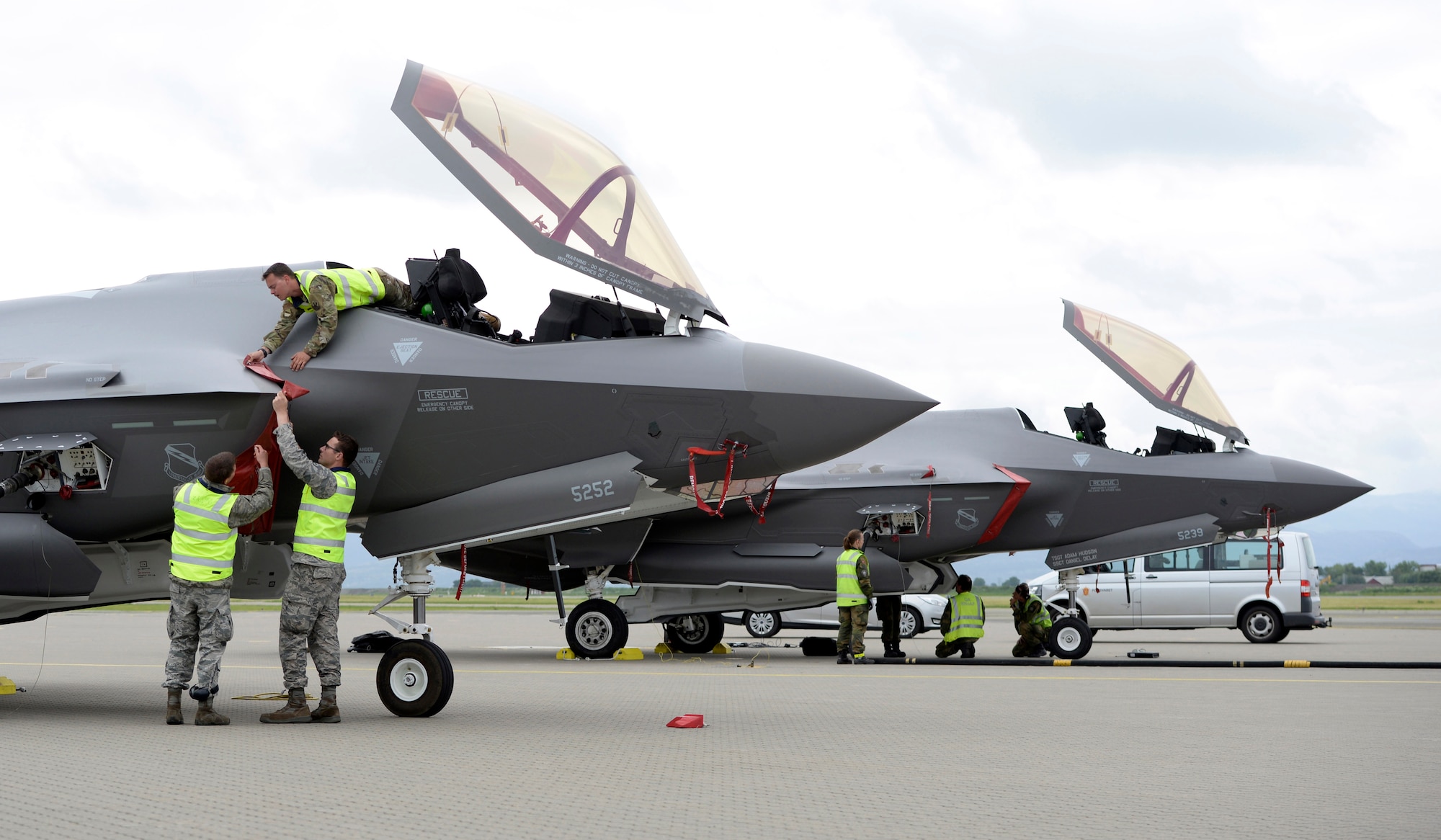 F-35 Lighting II maintainers from both the United States Air Force and Royal Norwegian Air Force work together at Orland Air Base, Norway, to turn two American jets after a sortie June 17, 2019. The visit marked the first time American F-35s have landed in Norway, which operates its own fleet of the fifth-generation fighters, and served as valuable training for the Norwegian maintainers. A fleet of F-35s is currently deployed to Europe as part of the European Deterrence Initiative, as as a way of proving the U.S. Air Force's ability to rapidly deploy fifth-generation fighters to European bases. (U.S. Air Force photo by Master Sgt. Austin M. May.)