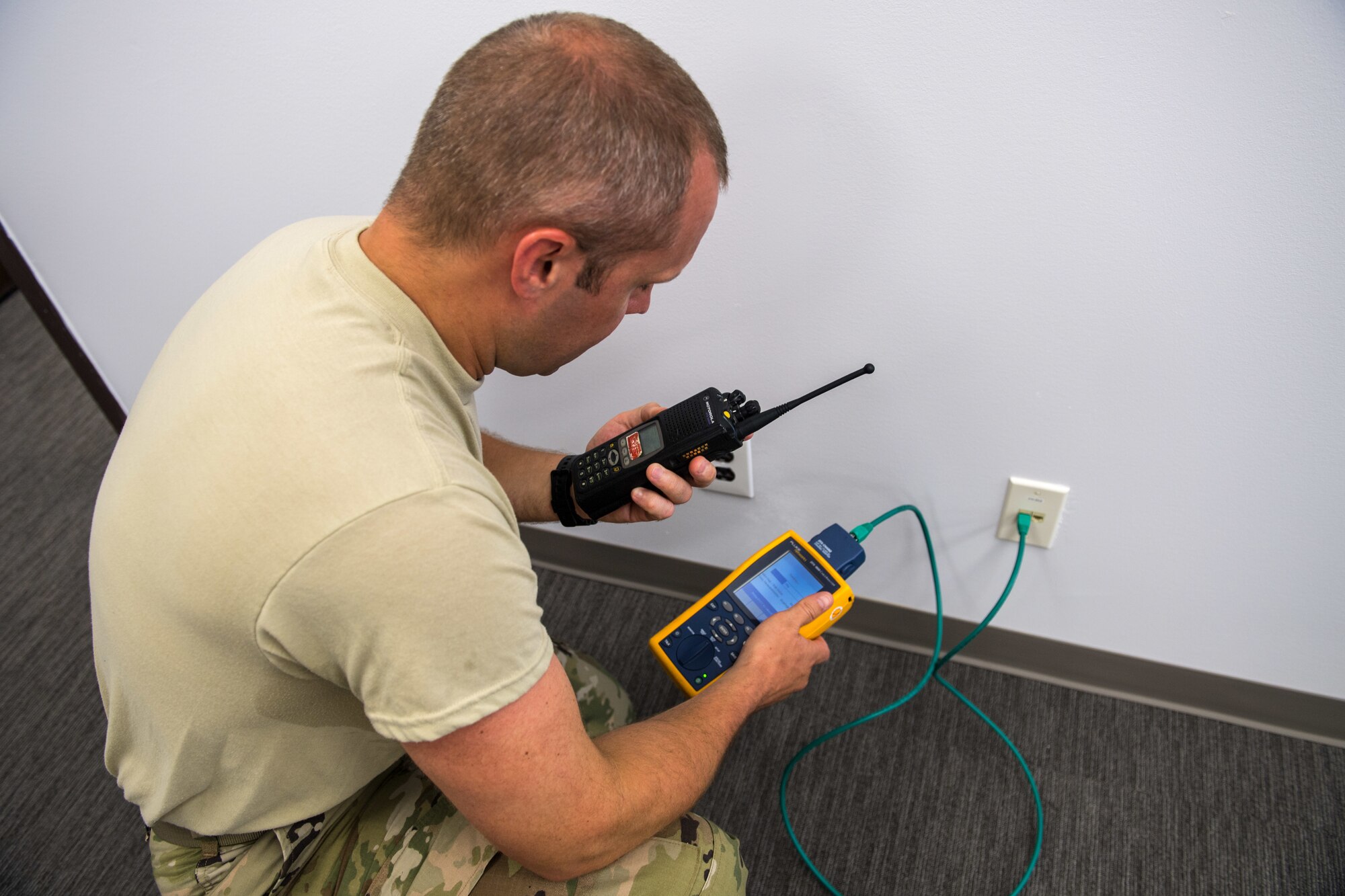 U.S. Air Force Master Sgt. Brian Lawrence, 178th Communications Squadron quality assurance NCO in charge from the Ohio Air National Guard, tests the ports for connectivity at Tyndall Air Force Base, Florida, June 18, 2019.