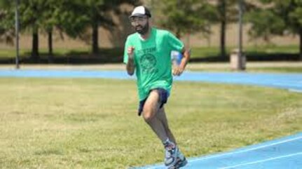 Michael Davis runs around the track at Joint Base Langley-Eustis, Virginia, June 3, 2019. In some of Davis’ races, he pushes disabled individuals in wheelchairs through the event. (Courtesy photo)