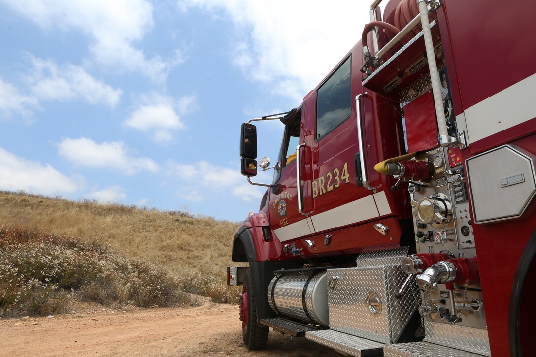 MCAS Miramar and the local fire departments prepare to conduct a controlled burn at MCAS Miramar, Calif., June 20. MCAS Miramar and local San Diego fire departments conducted this burn to reduce the risk of wildfires around MCAS Miramar and the surrounding community. (U.S. Marine Corps photo by Pfc. Andrew Hiatt)