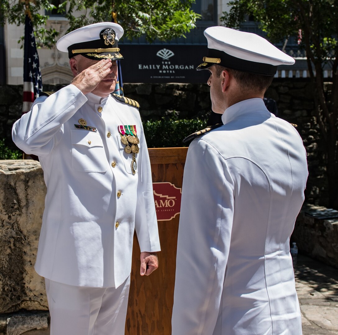 Cmdr. Nicholas Gamiz (right) assumes command of Navy Recruiting District San Antonio during a change of command ceremony at the Alamo June 7. Gamiz, a Naval aviator, will be responsible for 217 Sailors and support personnel supporting 34 Navy Recruiting Stations and Navy Officer Recruiting Stations spread throughout 144,000 square miles of Texas territory.