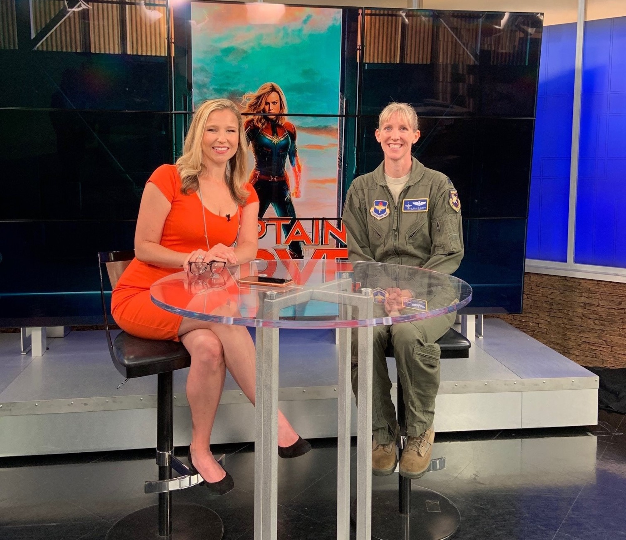 Lt. Col. Olivia Elliott, visited news station Fox 19 to talk about her career as an Air Force pilot to news anchor Rebecca Smith in Cincinnati, Ohio on June 11.As part of the DVD and digital release of the Captain Marvel movie, Elliott had the opportunity to share her experiences as a pilot. (U.S. Air Force photo/Stacey Geiger)