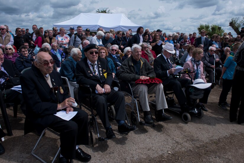 Members of the public, veterans and service members gather during the RAF Ramsbury Airfield Dedication ceremony June 9, 2019, at Ramsbury Airfield, U.K. The Remembrance Project brought veterans, Joint Base Charleston service members, RAF service members, and the public to this final ceremony. The ceremonial event was held to honor the sacrifices and strengthen the bond between the U.S. and UK. The final stage of this Airfield Remembrance Project coincides with the 75th anniversary of D-Day.