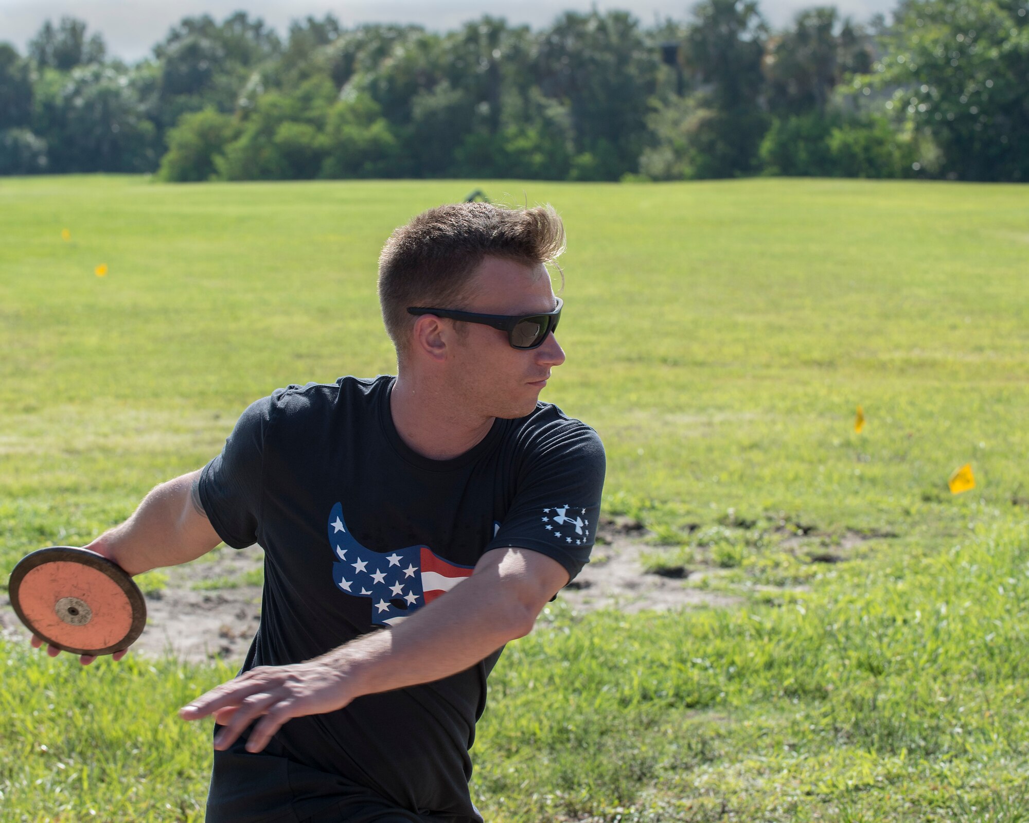 U.S. Army Staff Sgt. Russell Ruth, a wounded warrior athlete, practices a discus throw at MacDill Air Force Base, Fla., June 20, 2019.