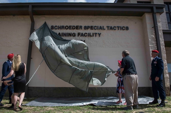 Leadership with the 24th Special Operations Wing and family members of U.S. Air Force Lt. Col. William “Bill” Schroeder unveil Schroeder’s name on the Special Tactics Training Squadron annex building during a building dedication ceremony at Hurlburt Field, Florida, June 21, 2019. The STTS annex building formerly housed the 10th Combat Weather Squadron preceding its inactivation in May 2014. Schroeder, a Special Operations Weather Officer, was the final commander of the squadron prior to his command of the 342nd Training Squadron, Lackland Air Force Base, Texas. Schroeder was fatally wounded when he placed himself between an armed individual and members of his squadron, allowing them to escape unharmed, in April 2016. (U.S. Air Force photo by Senior Airman Rachel Yates)
