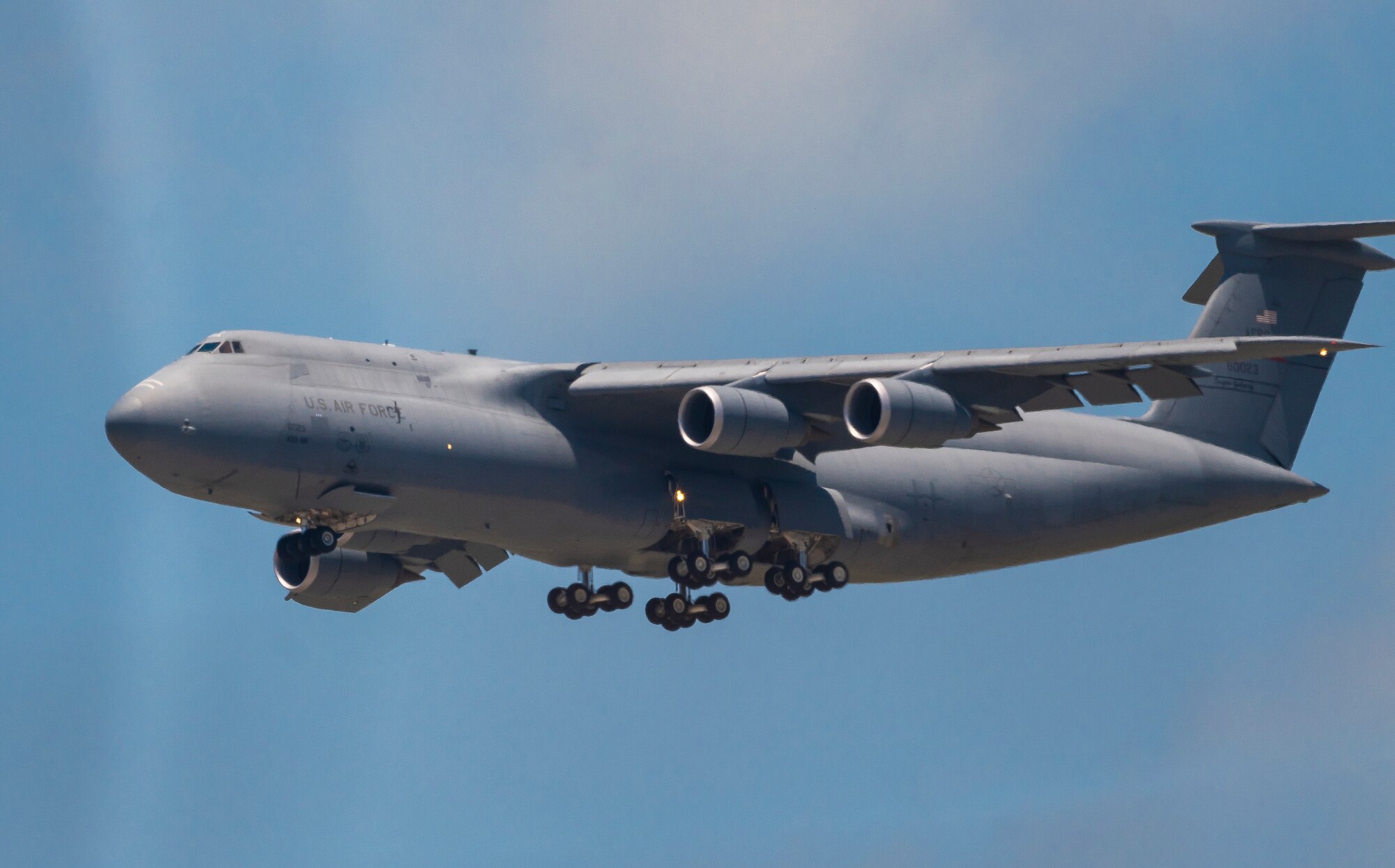 A C-5M Super Galaxy attached to the Air Force's 433rd Airlift Wing at Joint Base San Antonio-Lackland, Texas, flies over Naval Air Station Corpus Christi as part of a demonstration for Training Squadron 35's Pilot for a Day program.