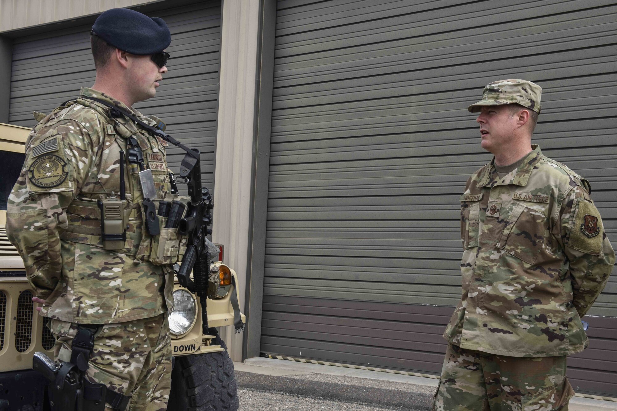 U.S. Air Force Chief Master Sgt. Charles Hoffman (right), Air Force Global Strike Command command chief, talks about leadership with Staff Sgt. Calan Lamberti,  security control supervisor, 377th Weapon System Security Squadron at Kirtland Air Force Base, N.M., June 13, 2019. Hoffman visited with Airmen across the 377th Air Base Wing to learn more about them and their mission. (U.S. Air Force photo by Airman 1st Class Austin J. Prisbrey)