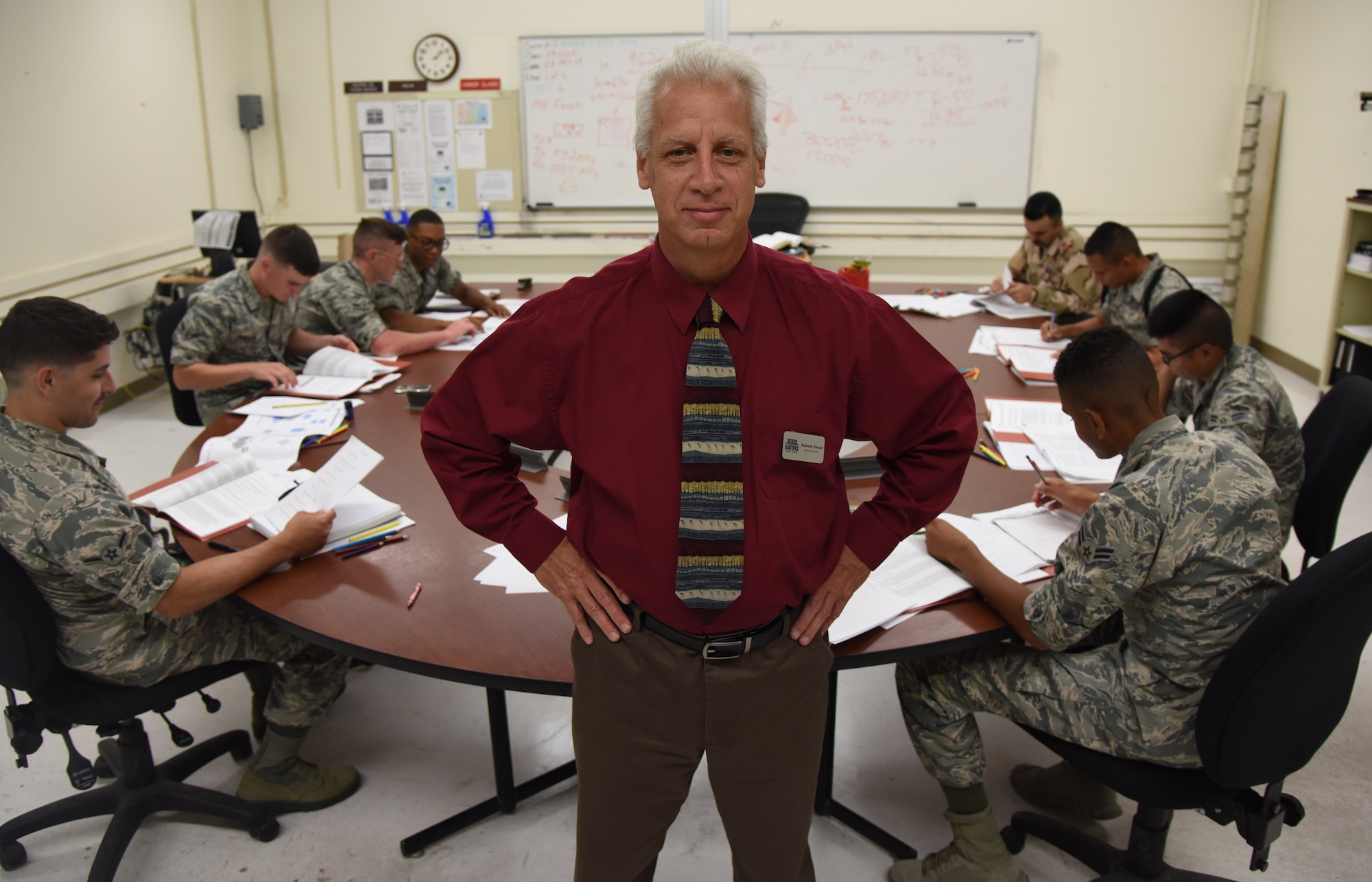 Robert Fried, 334th Training Squadron instructor, poses for a photo inside his classroom at Jones Hall on Keesler Air Force Base, Mississippi, May 28, 2019. Fried was awarded the 2018 Second Air Force Technical Training Instructor Civilian of the Year. (U.S. Air Force photo by Kemberly Groue)