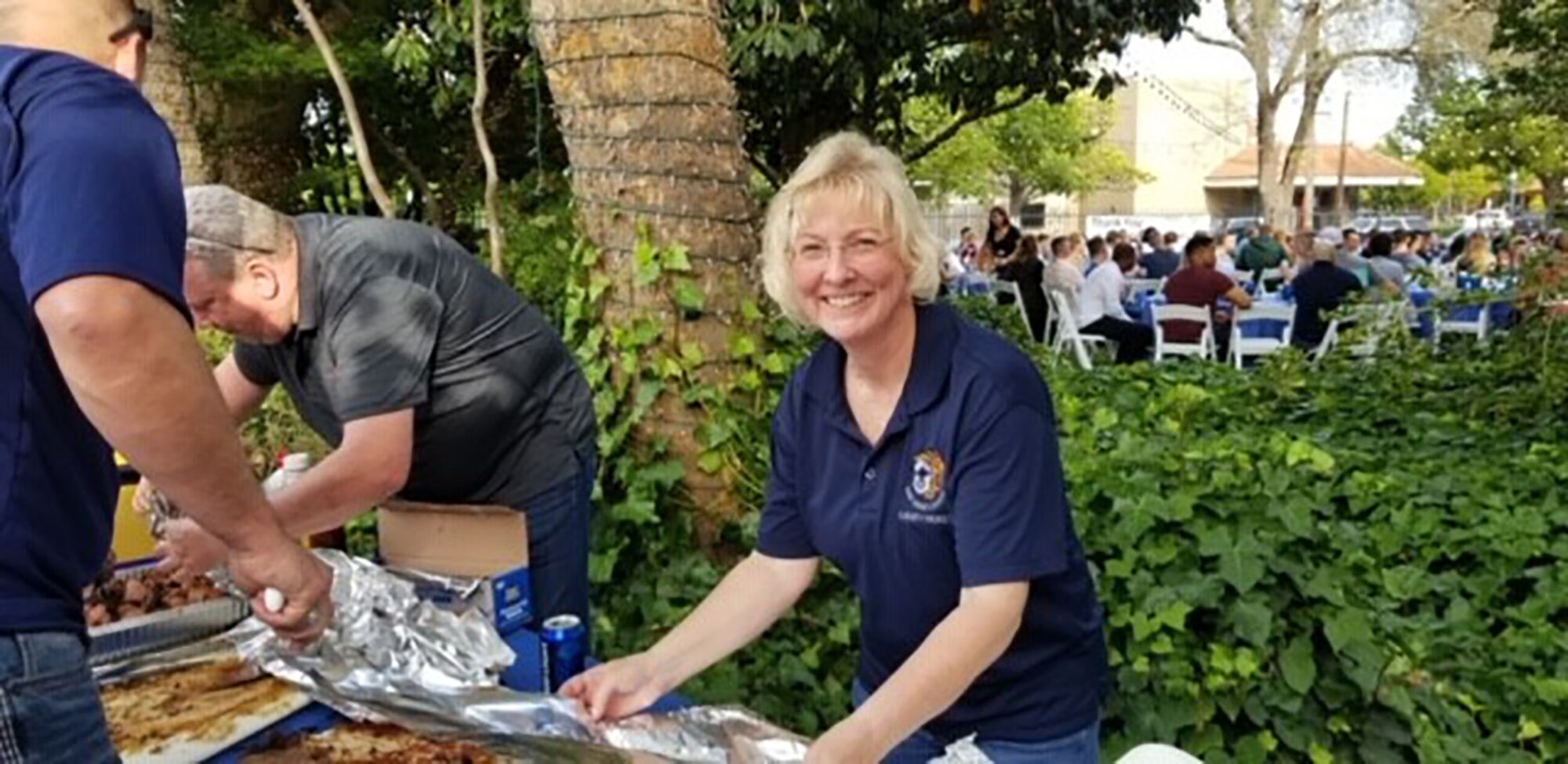 Team Travis Chiefs prepare the food for the NCO Appreciation Night.