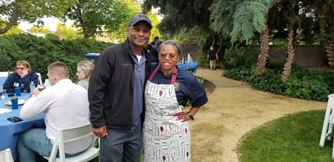Team Travis Chiefs prepare the food for the NCO Appreciation Night.
