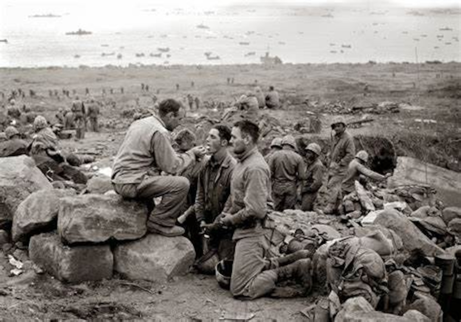 A U.S. Army Chaplain provides religious services for soldiers at Normandy, France, sometime after D-Day. This year marks the 75th anniversary of D-Day and was honored by U.S. Air Force Chaplain (Capt.) Lucas Dalgleish, 100th Air Refueling Wing chaplain, parachuting into Normandy, France, June 9, 2019, carrying a religious stole that began its ministry there 75 years ago. (Courtesy photo)