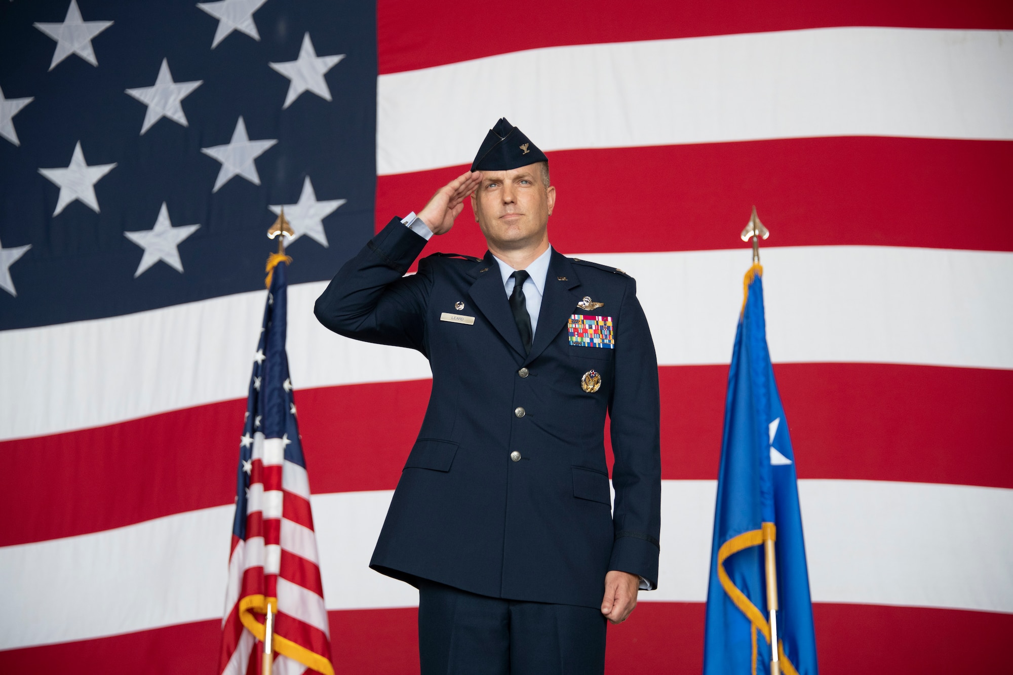 U.S. Air Force Col. Matthew Leard, 97th Air Mobility Wing commander, renders his first salute during the 97th AMW change of command, June 21, 2019, at Altus Air Force Base, Okla. Leard earned his commission through Officer Training School in 1999 and has since become a command pilot with more than 4,300 flight hours under his belt. (U.S. Air Force photo by Airman 1st Class Breanna Klemm)