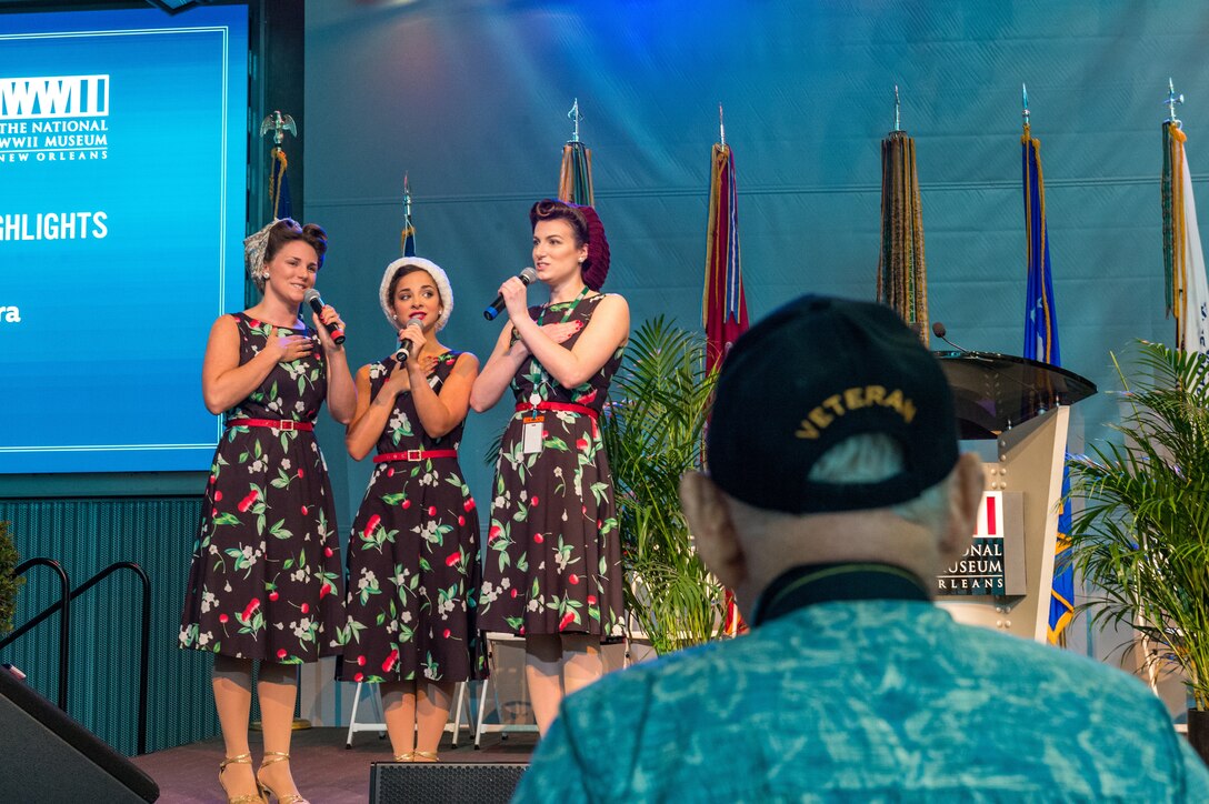Members of the “Victory Belles” singing group perform during the 75th D-Day Anniversary Ceremony at the National WWII Museum in New Orleans, La on June 6, 2019.