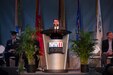 Dr. Keith Huxen, Senior Director of Research and History for the National WWII Museum in New Orleans, La. addresses museum guests on June 6, 2019.