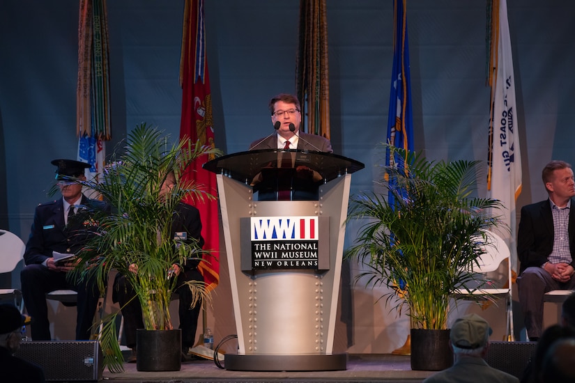 Dr. Keith Huxen, Senior Director of Research and History for the National WWII Museum in New Orleans, La. addresses museum guests on June 6, 2019.