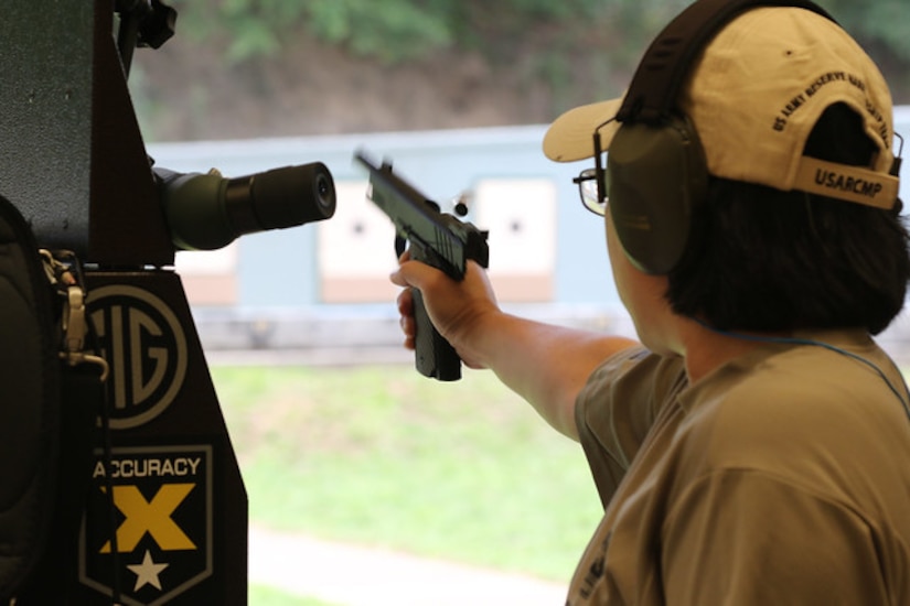 Staff Sgt. Sandra Uptagrafft (108th Training Command) firing at the 60th Annual Interservice Pistol Championship hosted and conducted by the U.S. Army Marksmanship Unit (USAMU) at Fort Benning.