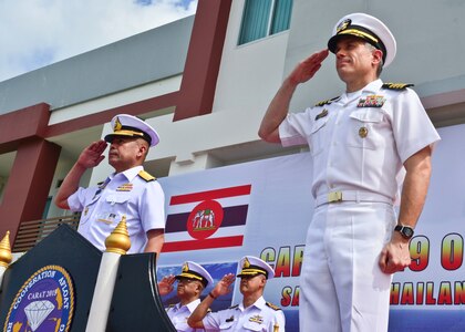 SATTAHIP NAVAL BASE, Thailand (May 29, 2019) - Capt. Matthew Jerbi, commodore of Destroyer Squadron 7, right, renders a salute alongside Royal Thai Navy Rear Adm. Paisarn Meesri, commander of Frigate Squadron 2, during the opening ceremony for Cooperation Afloat Readiness and Training (CARAT) Thailand 2019. (U.S. Navy photo by Mass Communication Specialist 1st Class Greg Johnson)