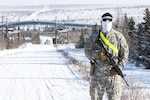 Spc. Roberto Terrazas, of the 220th Military Police Company, out of Colorado, maintains a checkpoint during Arctic Eagle 2018 at the Donnelly Training Area outside of Fort Greely, Alaska, Feb. 28, 2018. The National Guard, in partnership with active duty forces, local, state and federal agencies, can provide capabilities for homeland security and emergency response in the extreme cold-weather conditions of the Arctic region.