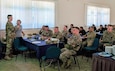 U.S. Army physician, Maj. Michael Eiffert, M.D. (far left), presents a Tactical Combat Casualty Care and Health Service Support in Peacekeeping Operations class, June 20, 2019, to medical participants at Steppe Eagle 19 at Illisky Training Area in Kazakhstan. The class was designed to teach medical providers from Kazakhstan, Tajikistan, and the Kyrgyz Republic about trauma care and preventive medicine.