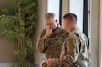 Brig. Gen. Aaron Walter, commander of the 100th Training Division-Leader Development, visits the officers attending the Command and General Staff College Phase Two 4x4 Course at Fort Belvoir, Virginia, June 10, 2019. The 4x4 course is a pilot program that allows Army officers to complete the second of three phases in person during four weekends instead of the previous option of eight weekend classes or through distance learning.