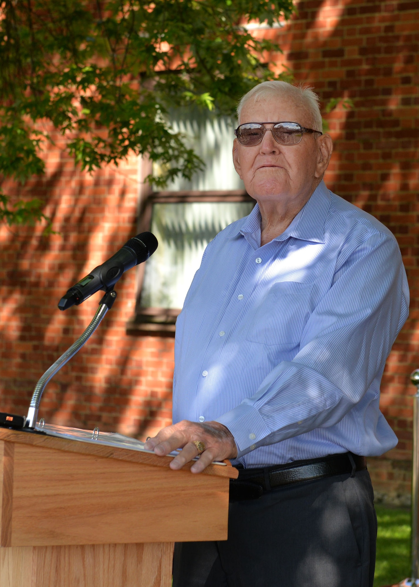 Retired Master Sgt. Dewey Christopher, a former 351st Bomb Squadron crew chief, 100th Bomb Group and World War II veteran, takes a minute to reflect and look around the audience gathered in his honor at the Professional Development Center renaming ceremony on RAF Mildenhall, June 21, 2019. The PDC was renamed the “Dewey R. Christopher Professional Development Center” to honor his legacy and enhance heritage for enlisted members. (U.S. Air Force photo by Karen Abeyasekere)