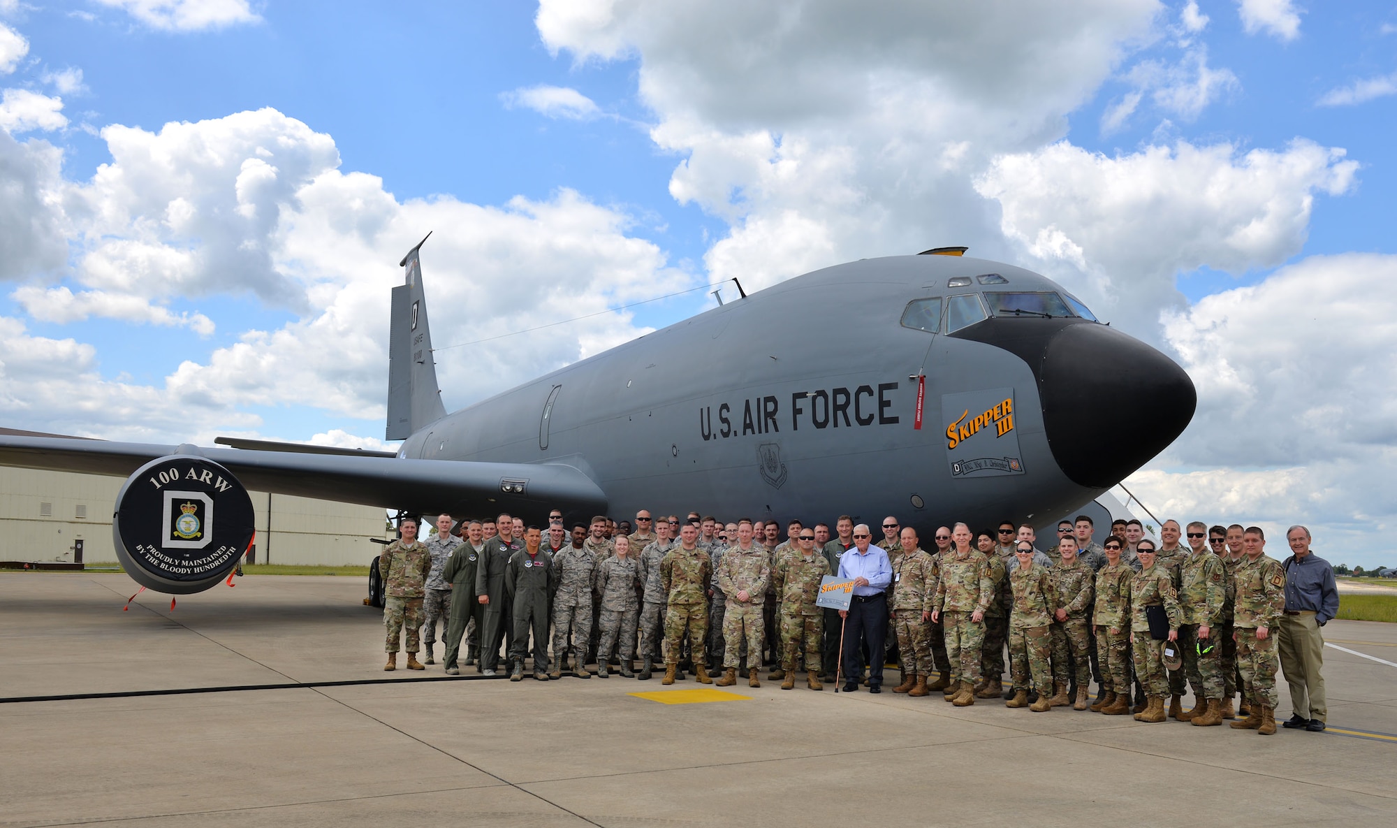 Members of the 100th Maintenance Group pose for a photo with retired Master Sgt. Dewey Christopher, a former 351st Bomb Squadron crew chief, 100th Bomb Group and World War II veteran on RAF Mildenhall, June 21, 2019. The 100th Air Refueling Wing’s lead KC-135 Stratotanker was renamed “Skipper III” for the day in Christopher’s honor, after the aircraft he looked after during World War II. (U.S. Air Force photo by Karen Abeyasekere)