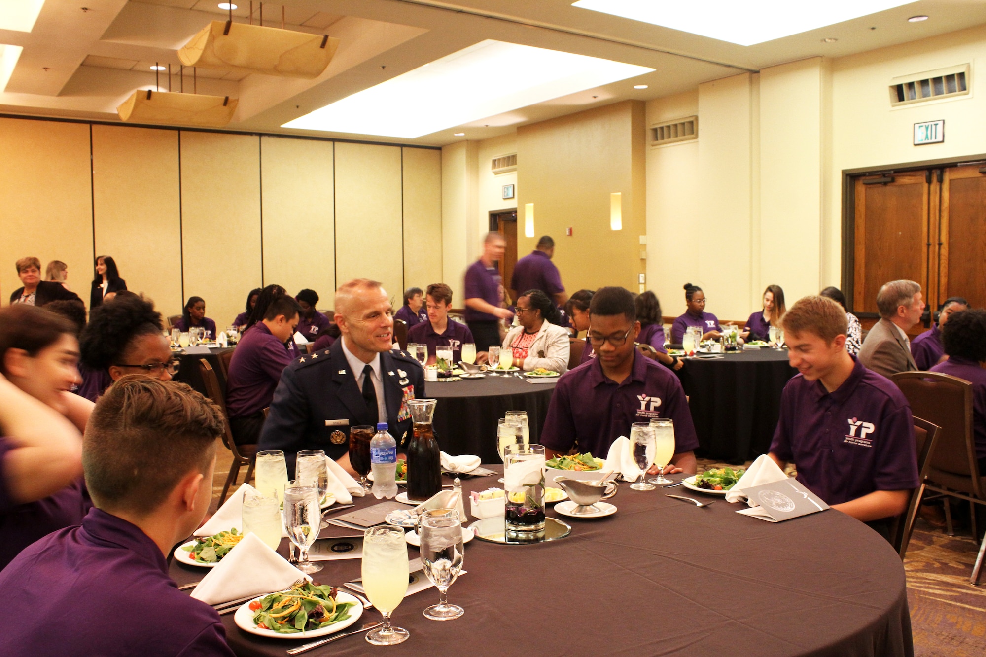 At center, Maj. Gen. Brad Spacy, Air Force Installtion and Mission Support Center commander, talks with attendees at the 2019 Military Youth of the Year Summit awards luncheon in San Antonio June 20, 2019. Spacy was guest speaker and awards presenter for the event. (U.S. Air Force photo by Debbie Aragon)