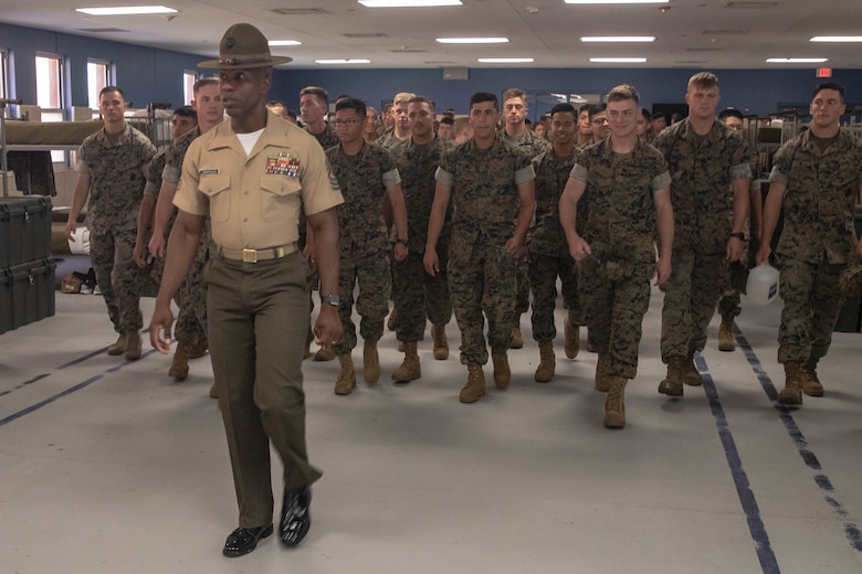 U.S. Marine Corps 1st Sgt. Nicholas Underwood with Company K, 3rd Recruit Training Battalion, Recruit Training Regiment, gives Marines from 2nd Transportation Support Battalion (2nd TSB), Combat Logistics Regiment 2 (CLR 2), 2nd Marine Logistics Group (2nd MLG) a tour of Company K’s recruit living quarters at Marine Corps Recruit Depot (MCRD) Parris Island, S.C., June 14, 2019. Marines with 2nd TSB participated in a professional military education trip to MCRD Parris Island to reinforce core values and gain a different perspective on recruit training. (U.S. Marine Corps photo by Lance Cpl. Scott Jenkins)