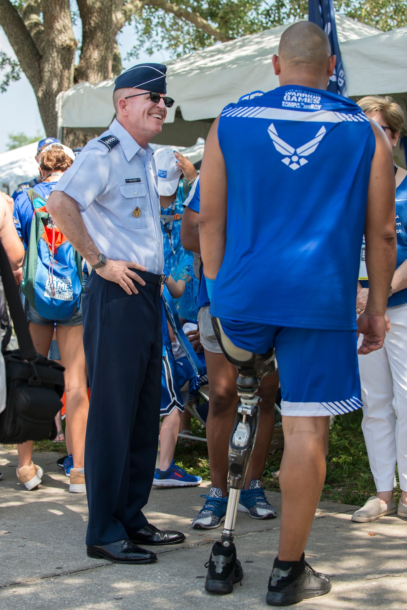 U.S. Air Force Gen. Stephen W. Wilson, Vice Chief of Staff of the Air Force, speaks with Senior Master Sgt. Brian Williams, a wounded warrior athlete, at the University of South Florida, Tampa, Fla., June 23, 2019.