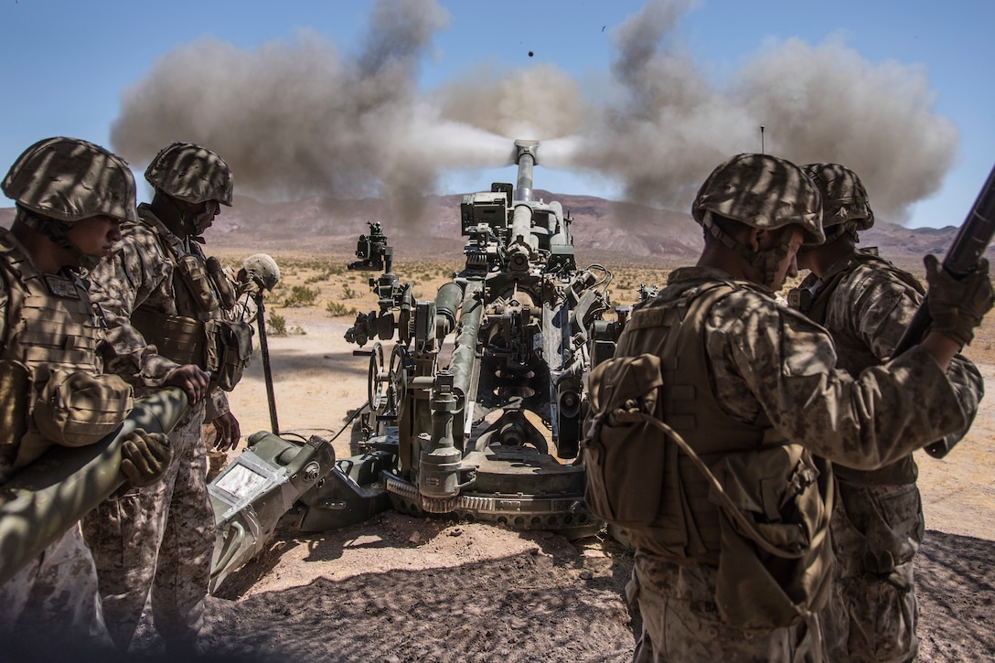 U.S. Marines with November Battery, 5th Battalion, 14th Marine Regiment, 4th Marine Division operate an M777 Howitzer during Integrated Training Exercise 4-19 at Marine Corps Air Ground Combat Center Twentynine Palms, Calif., June 14, 2019. ITX is a live-fire and maneuver combined arms exercise designed to train battalion and squadron-sized units in tactics, techniques, and procedures required to provide a sustainable and ready operational reserve for employment across the full spectrum of crisis and global engagement.