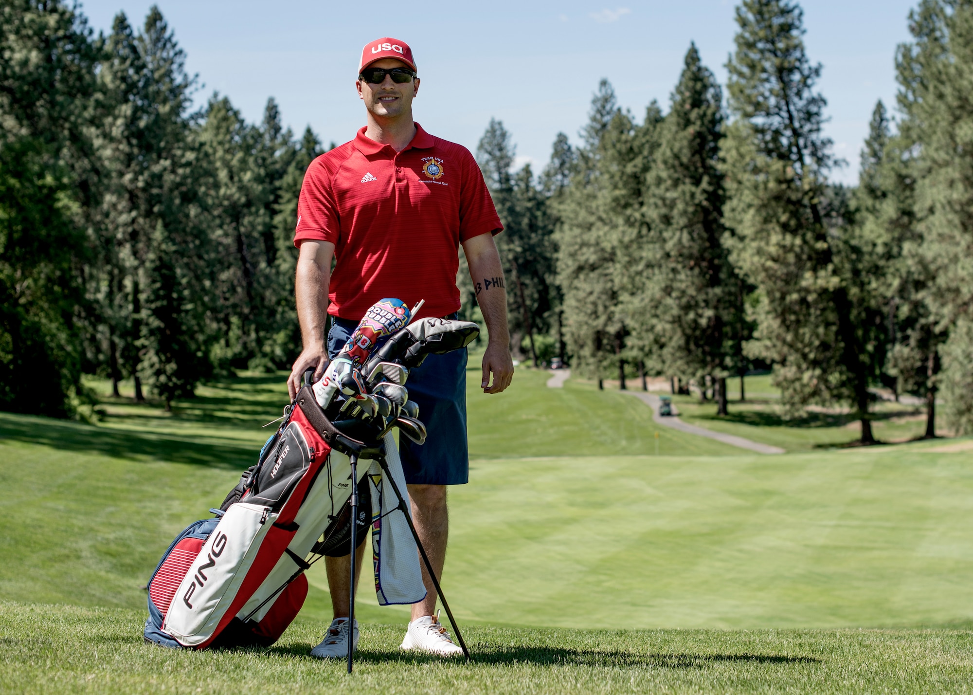 U.S. Air Force Staff Sgt. Dolton Dishman, 92nd Operations Support Squadron flotation equipment NCO in charge, poses for a photo at Indian Canyon Golf Course in Spokane, Washington, May 14, 2019. Dishman recently participated in the 2019 Armed Forces Golf Championship, qualifying for the 7th Conseil International du Sport Militaire Military World Games in China. (U.S. Air Force photo by Airman 1st Class Whitney Laine)